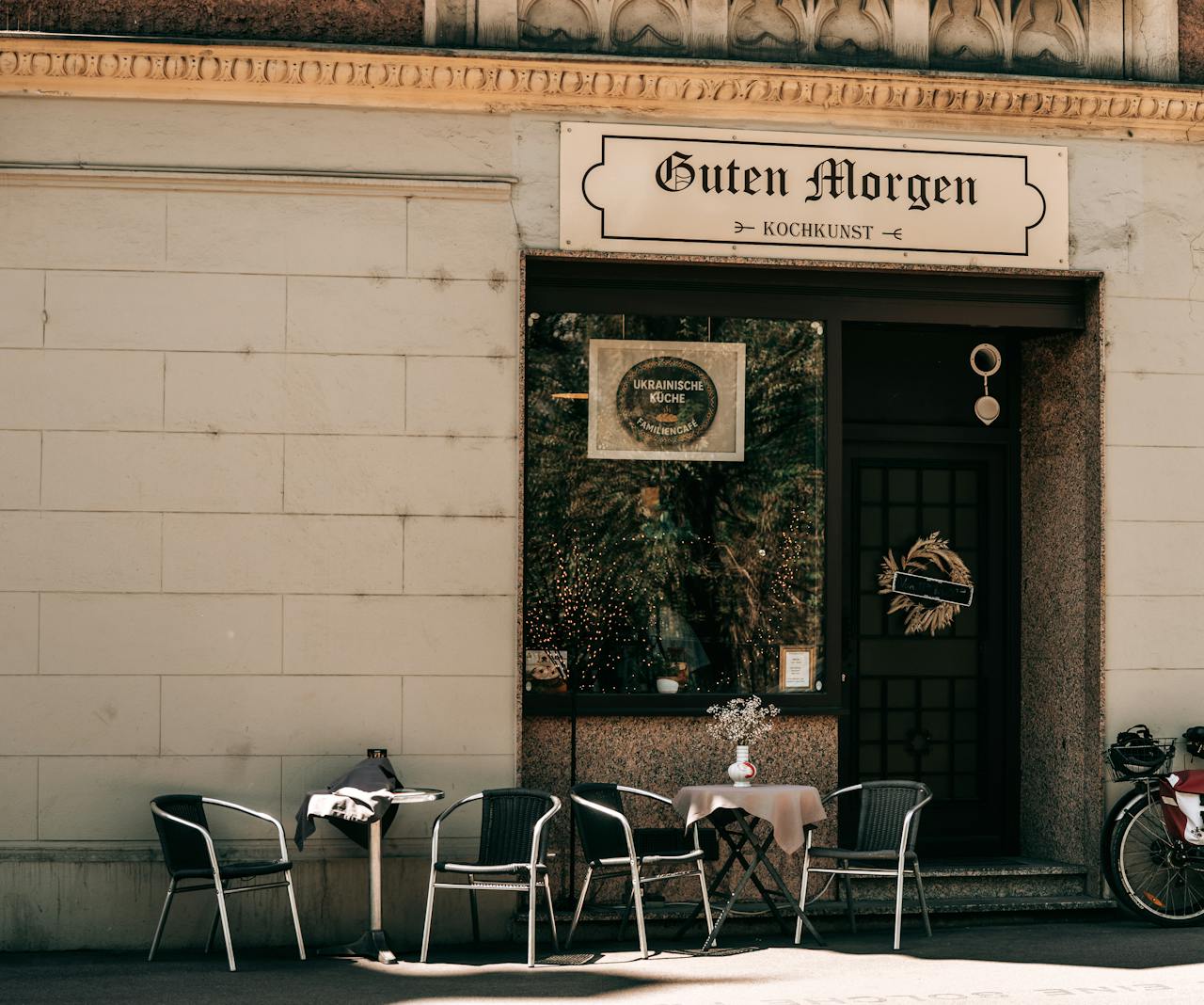 Charming street café in Graz, Austria with outdoor seating and inviting atmosphere.